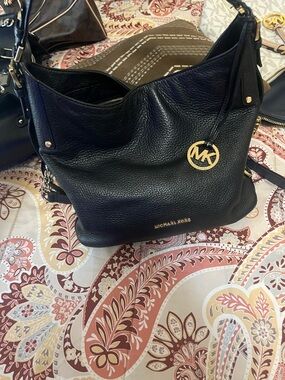 Michael Kors Black Pebbled Leather Hobo with Gold MK Charm